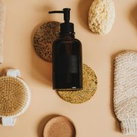 Organic skincare essentials arranged in a flat lay for a minimalist aesthetic.